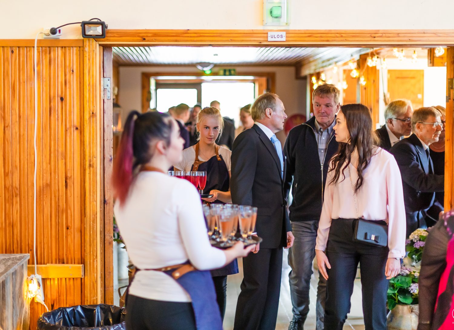 People coming to the wedding party.